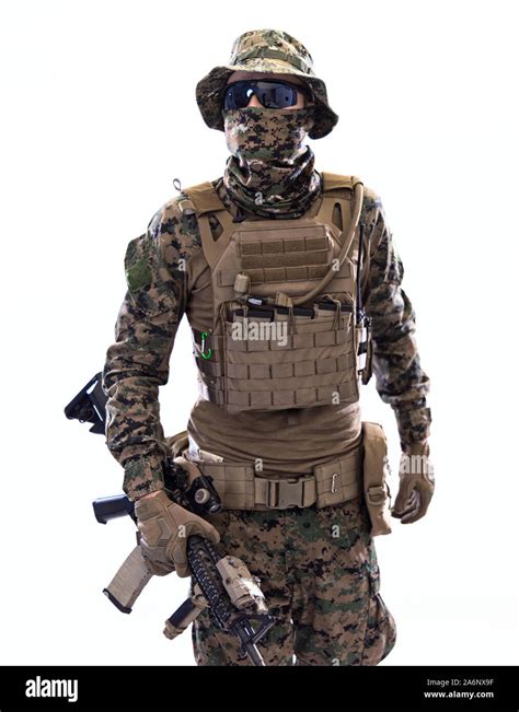 american marine corps special operations soldier with fire arm weapon and protective army ...