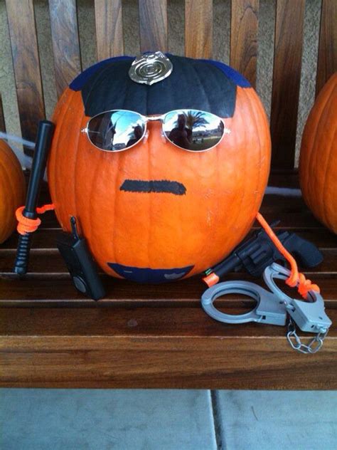 Painted pumpkins -police | Halloween pumpkin designs, Pumpkin halloween decorations, Pumpkin ...