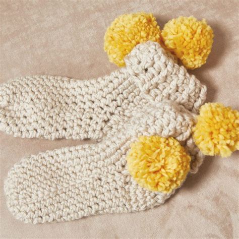 Pom Pom Slippers Crochet Pattern | AllFreeCrochet.com