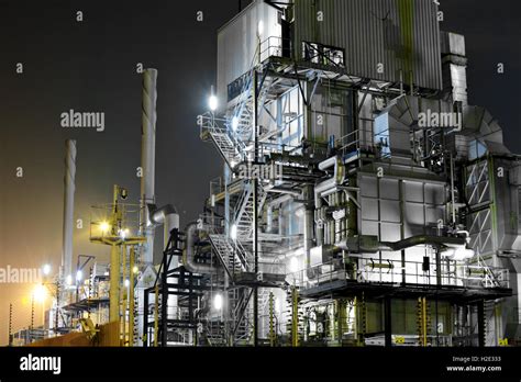 Industrial complex at night Stock Photo - Alamy