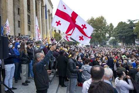 Ruling party leads in Georgia elections, opposition protests - CGTN