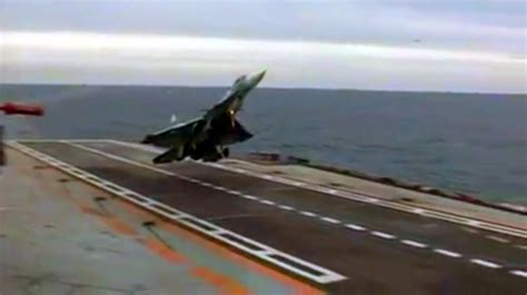 Fighter Jet Landing On Aircraft Carrier