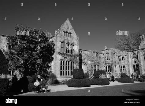 couple sitting in front of ruined house in English garden West Sussex England Stock Photo - Alamy