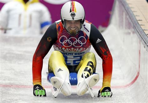 Germany’s Andi Langenhan starts in the men’s singles luge competition at the 2014 Sochi Winter ...