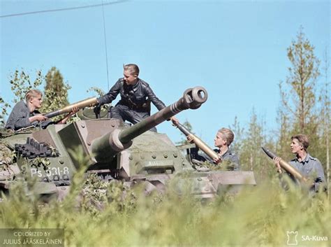 A Finnish tank crew restocking ammunition for their Sturmgeschütz III ...