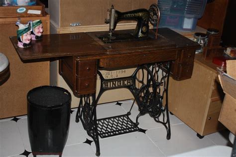 Sewing Machine- Singer foot pedal in cabinet - Mar 03, 2013 | New England Auction Company, Inc ...