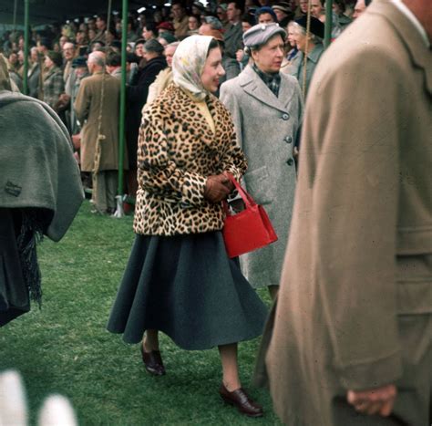 The Princess dons a leopard coat at the Badminton Horse Trials with Mary, the Princess Royal in ...