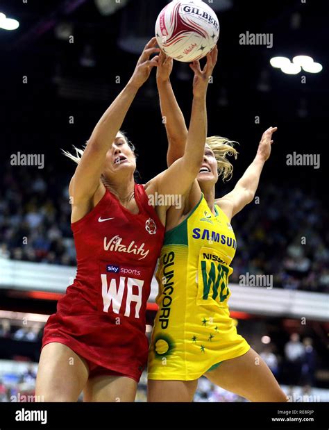 England Vitality Roses' Chelsea Pitman (left) and Australian Diamonds Kate Moloney battle for ...