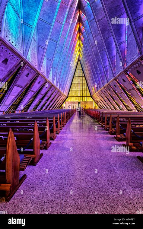 Stain Glass windows coloring the inside of the Protestant Chapel at the US Air Force Academy ...