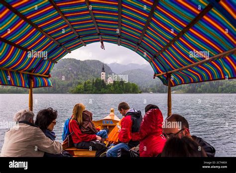 Traditional Pletna rowing boat ride to Lake Bled Island and the Church of Assumption, Bled ...