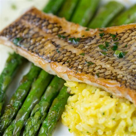 Seared Sea Bass with Fresh Herbs and Lemon recipe | Epicurious.com