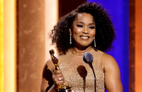 Angela Bassett thanks fans for 'decades and decades' of support as she accepts honorary Oscar