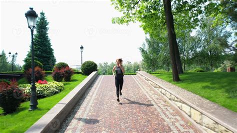 Athlete woman jogging in park. Sport woman at morning workout 11461215 ...