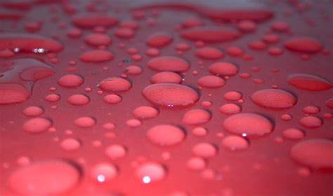 Water Droplets on a Red Vinyl Tabletop | Bart Everson | Flickr