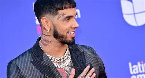 Profiting off His Ex? Anuel AA Reveals He Kept His Karol G Tattoo