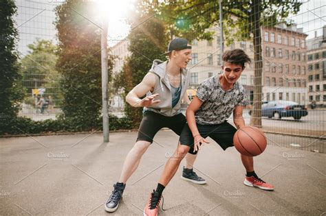 Teenagers playing basketball | High-Quality Sports Stock Photos ...