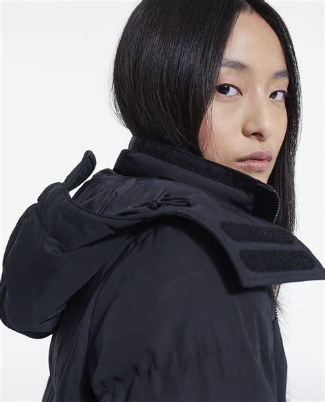 Long black down jacket with straps and logo | The Kooples - US