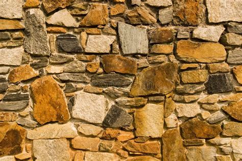 Rust Colored Stone Wall stock photo. Image of neutral - 3258474