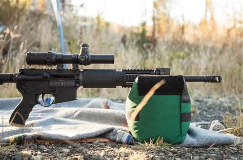 ".223 Rifle With Scope" by Stocksy Contributor "Ryan Matthew Smith ...