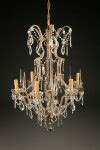6 arm iron and crystal Italian antique chandelier with beads on arms and crystal spikes.