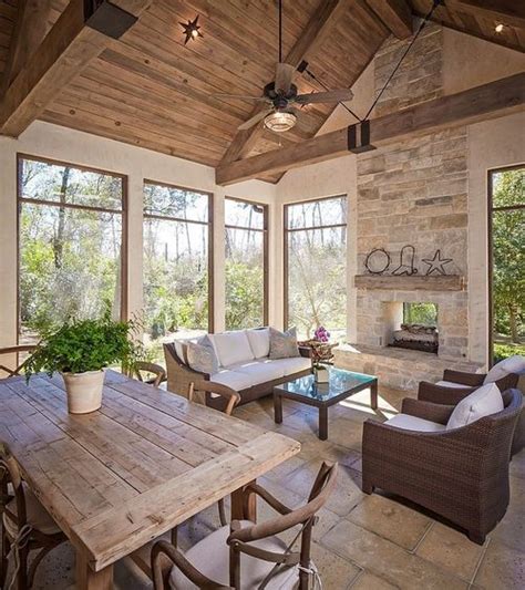 Neutral sunroom, fire, stone, wood panelling, beams. | Traditional ...