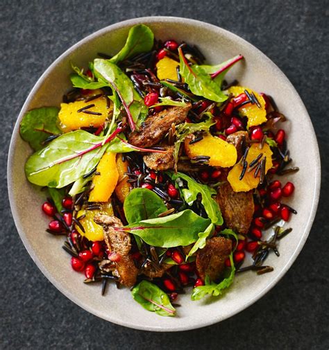 Spiced duck breast with orange and pomegranate wild rice ...