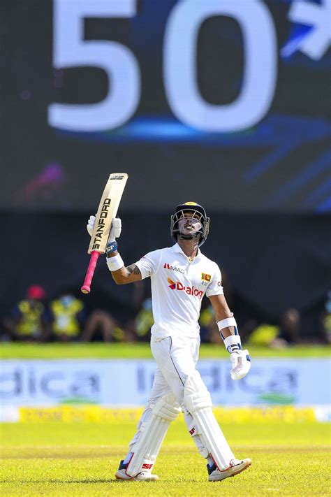 Pathum Nissanka raises his bat on getting to a fifty | ESPNcricinfo.com