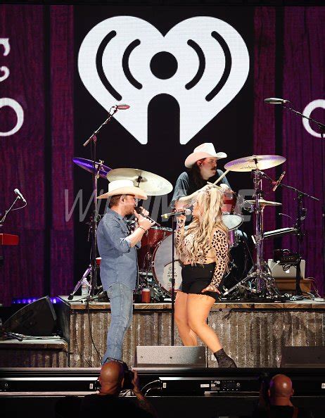 Justin Moore and Priscilla Block perform onstage during the 2023 ...