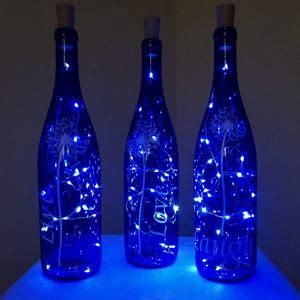 Handpainted Lighted Blue Wine Bottle with Birch trees and cardinals | Blue wine bottles, Wine ...