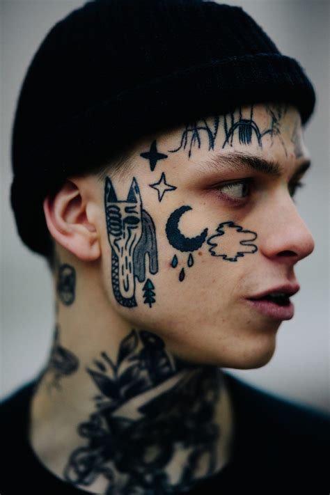 Closeup of man with face tattoos Mens Face Tattoos, Face Tats, Facial Tattoos, Wrist Tattoos ...