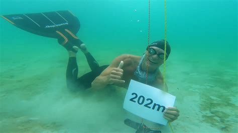 Danish free diver breaks world record swimming 202 metres with one ...