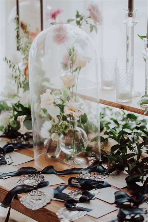 Neutral Flowers Under Glass Cloche Centerpiece