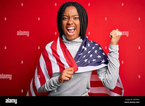 Young african american patriotic woman wearing united states of america ...