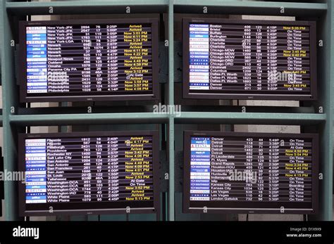 airport arrival and departure schedule board Stock Photo - Alamy