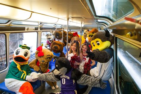 Pac-12 mascots ride Seattle monorail before women’s basketball tournament | The Seattle Times