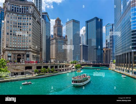 Downtown skyline and river cruise boat on the Chicago River near the ...