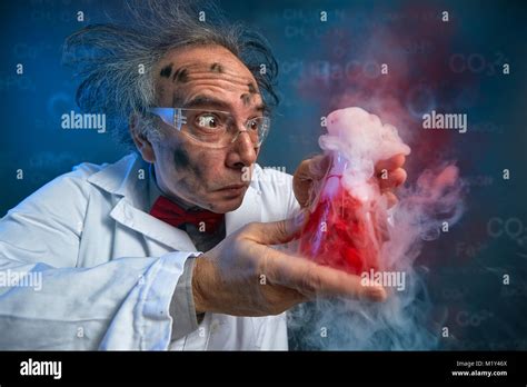 wacky scientist with explosive experiment, funny chemist Stock Photo ...