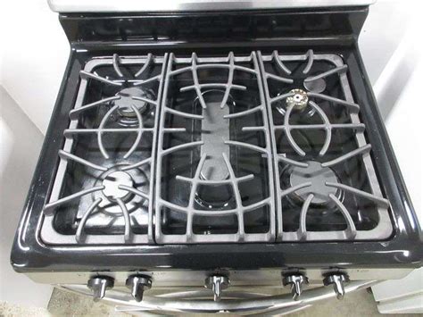 Frigidaire gas stove, gallery edition, 29 1/2"W, missing middle burner ...