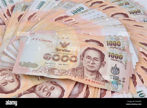 Thai currency 1000 baht hi-res stock photography and images - Alamy