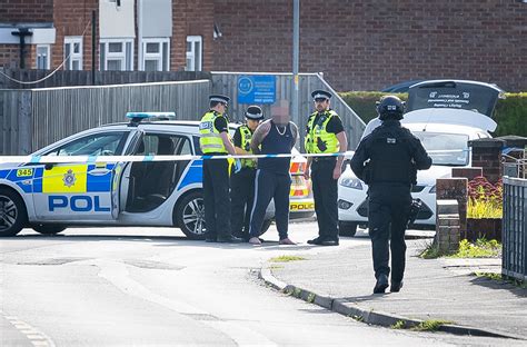 Suspected gunman in custody after armed police siege in Swindon