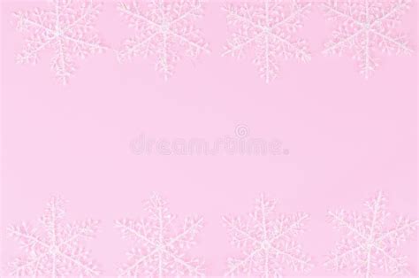 Snowflakes On A Pink Background Stock Photo - Image: 63080766