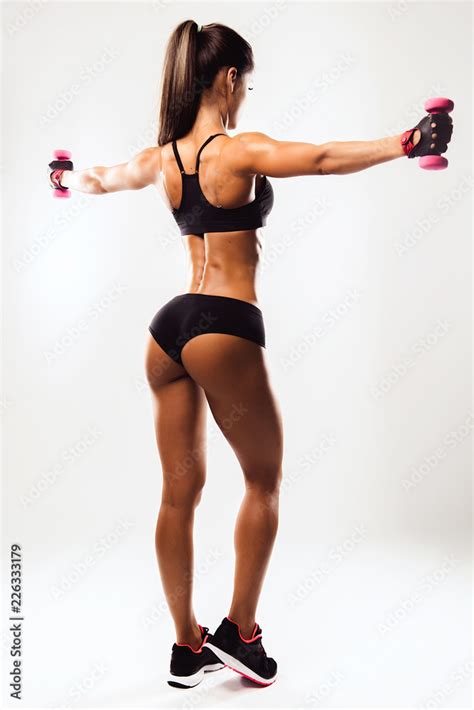 Perfect Fitness Body of Beautiful Woman. Fitness Instructor in Sports Clothing. Female Model ...