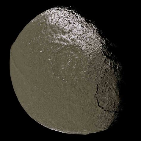 Saturn’s Two-Faced Walnut Shaped Moon Iapetus - Spaceopedia