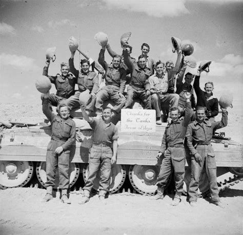 Crews posing with a Crusader tank and thank you note (”Thanks for the tanks, from Libya”.) to ...