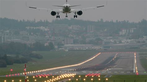 Airplane landing at the airport 28562736 Stock Video at Vecteezy