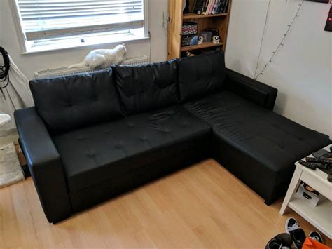 Black Eco Leather corner sofa bed with storage | in Chelsea, London | Gumtree