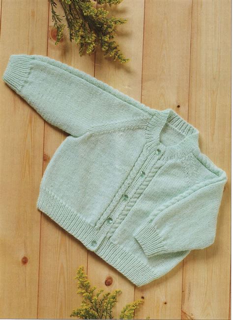 Lovely easy Knit 4 ply baby Cardigan Knitting Pattern- Cable pattern 7426806854594 | eBay