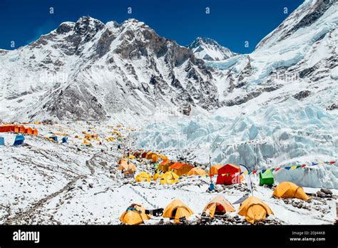 Bright yellow tents in Mount Everest Base Camp, Khumbu glacier and ...