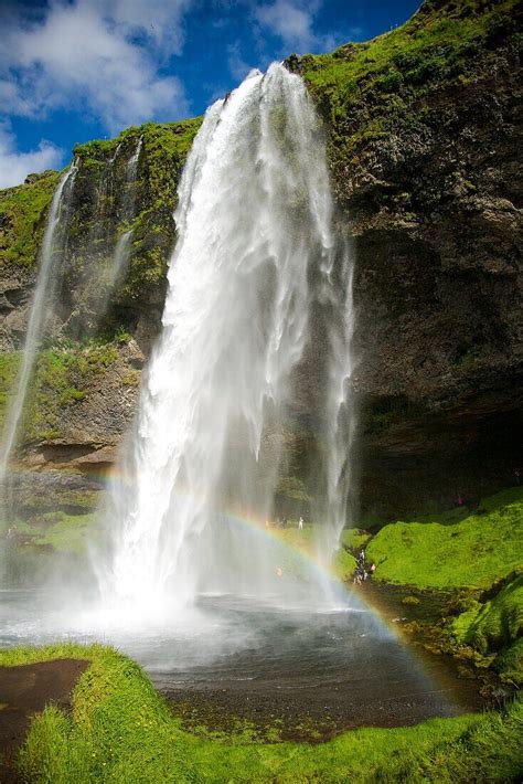 Seljalandfoss waterfall with rainbow at … – License image – 71180542 ...