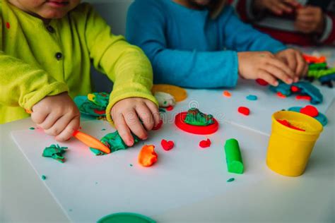 Kids Play with Clay Molding Shapes, Learning through Play Stock Image ...